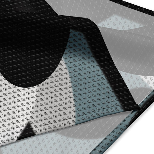 Close-up of a soft fabric with an abstract black and white pattern showcasing the texture and edge details of the Abstract Art Bandana.