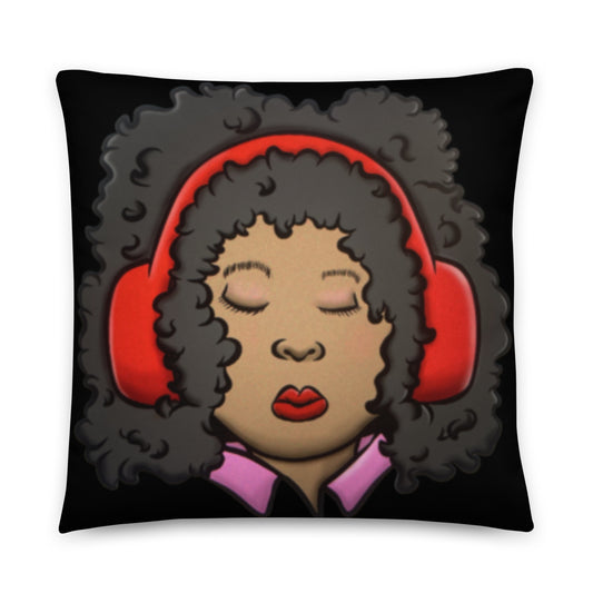 Issa Pillow featuring a stylish illustration of a woman with curly hair wearing red headphones, her eyes closed and lips pursed, on a black background.