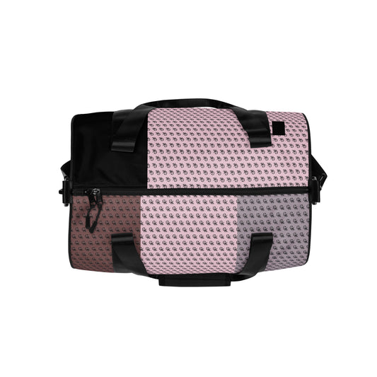 Gym Bag – Pretty in Pink featuring a stylish patchwork design with various shades of pink and black handles, ideal for carrying workout essentials.