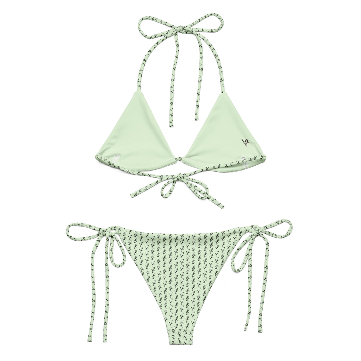 Emerald Script Recycled String Bikini featuring a solid light green triangle top with patterned trim and matching patterned tie-side bottoms made from eco-friendly materials.