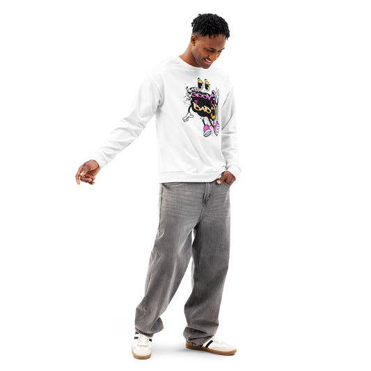 Man wearing a white cotton Groovy Baby Sweatshirt with a colorful, playful graphic design, paired with grey jeans and white sneakers, standing against a white background.