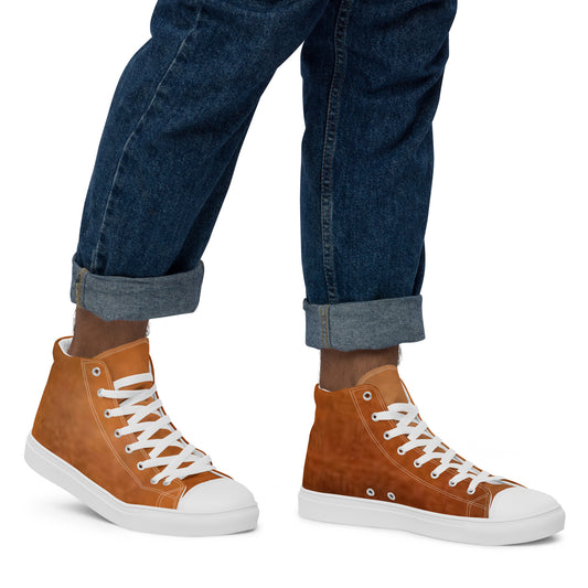 Person wearing rolled-up dark blue jeans and Tan Leather Look Men's High Top Sneakers with white soles and laces, showcasing casual faith-inspired apparel with purpose-driven messaging.