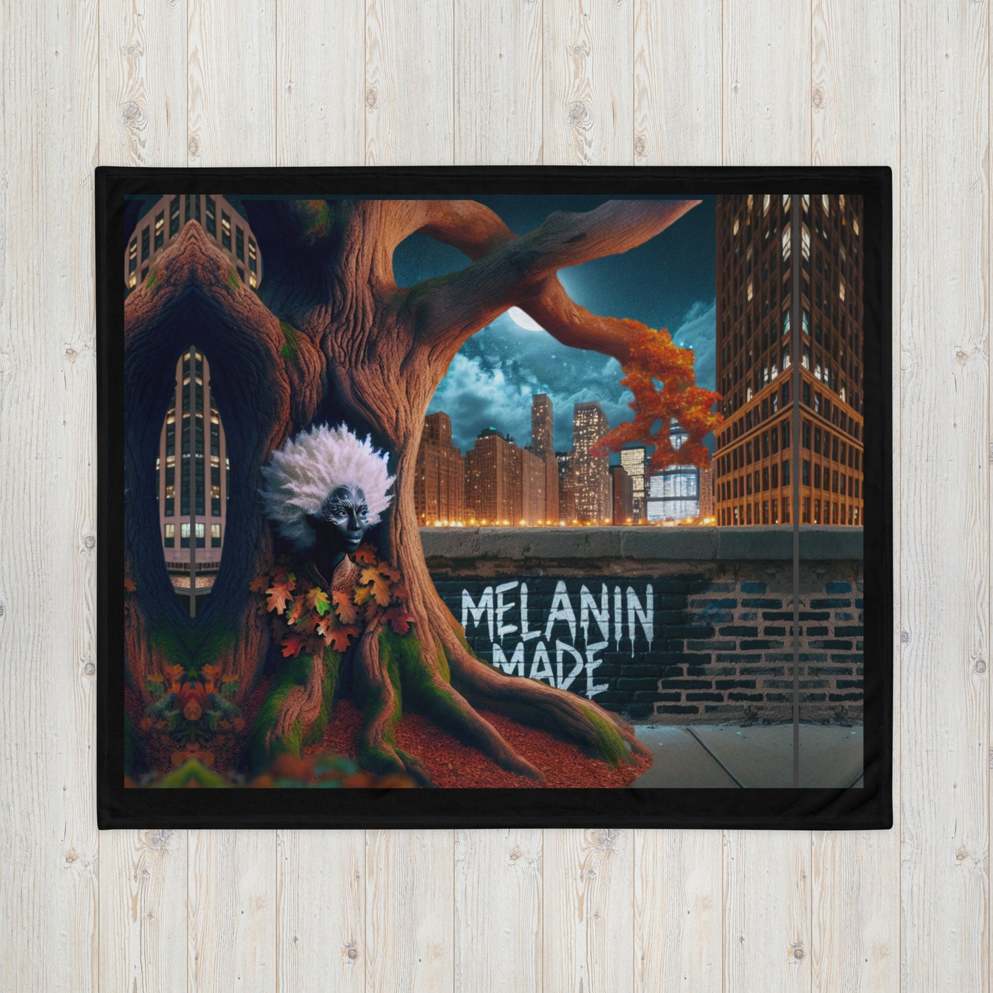 Throw Blanket – Midnight Roots featuring urban cityscape with a large tree blending into the skyline, showcasing vibrant autumn leaves and the phrase "Melanin Made," blending melanin-rich imagery with home decor.