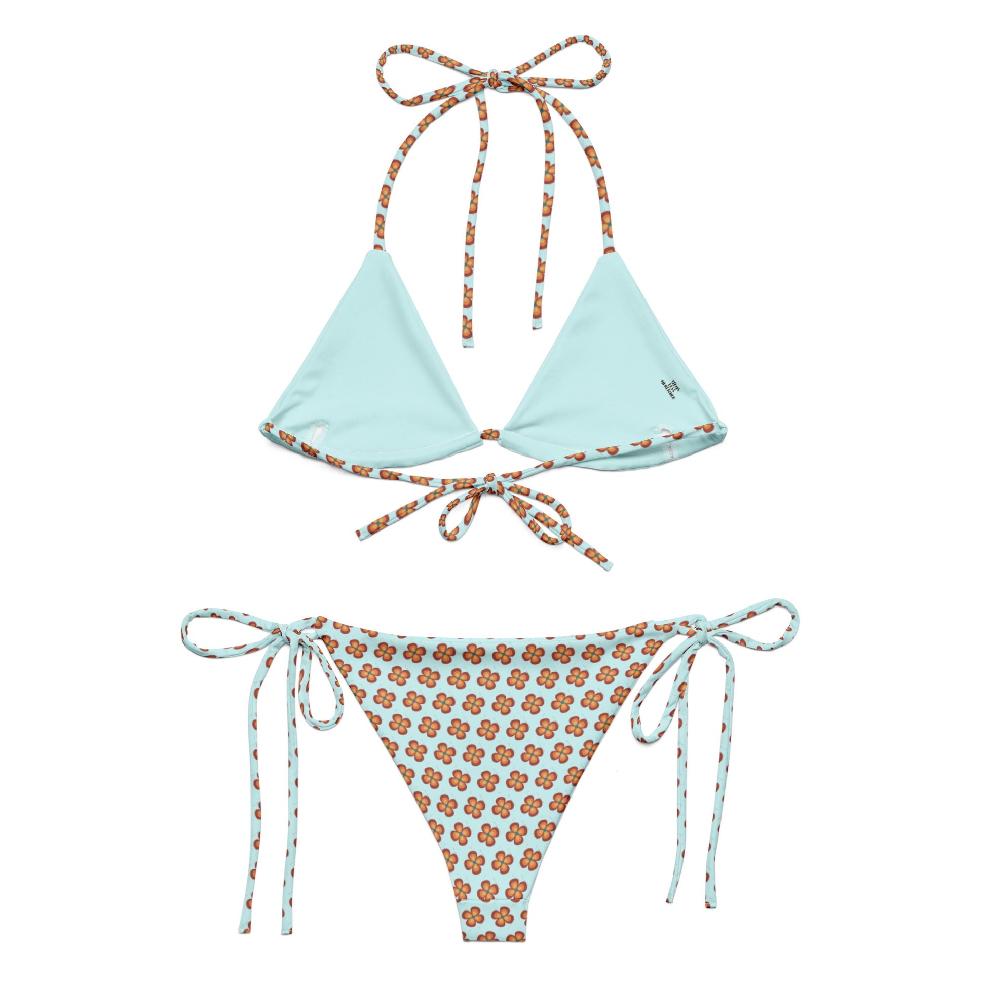 Garden Teal Recycled String Bikini featuring a teal triangle top with floral-patterned tie straps and matching floral-patterned tie-side bottoms in eco-friendly fabric.