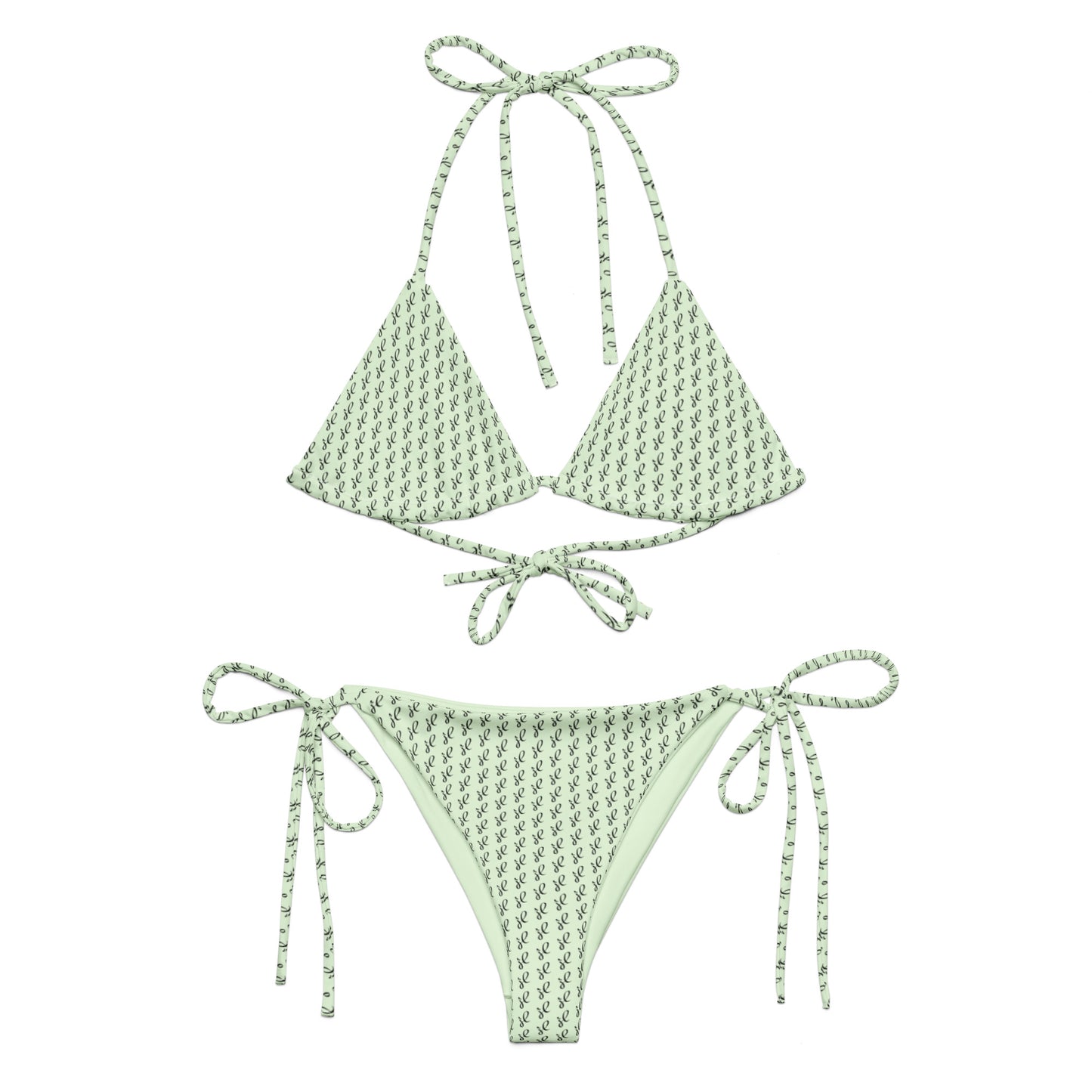 Emerald Script Recycled String Bikini in light green with delicate dark script pattern, featuring adjustable tie straps on top and bottom for a customizable fit.
