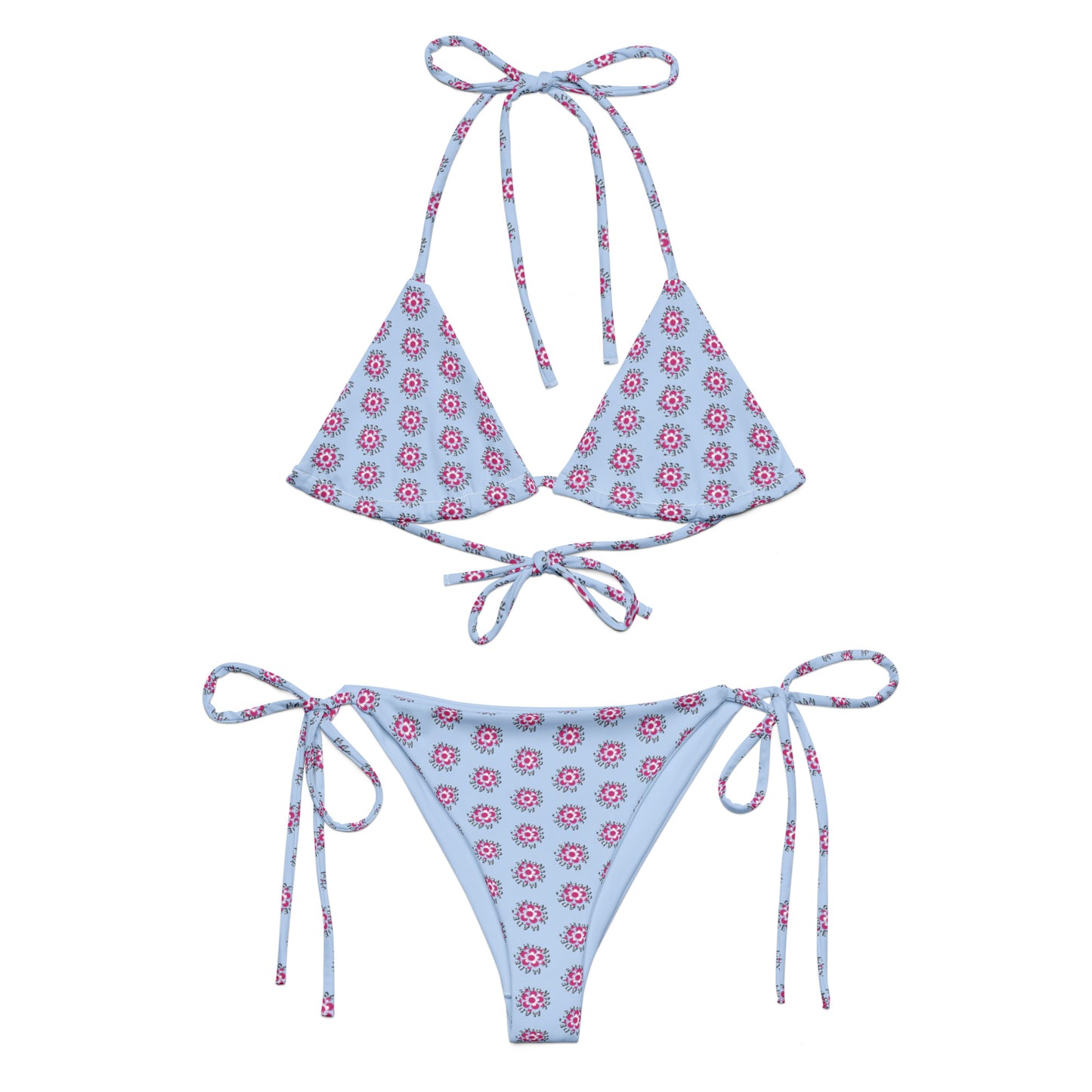 Blue Bloom Recycled String Bikini featuring a light blue fabric with a pink and white floral pattern, adjustable halter neck and side tie closures for a customizable fit.