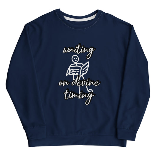 Waiting on Divine Timing Sweatshirt in navy blue featuring a simple white angel illustration and cursive script with inspirational faith-inspired messaging for purpose-driven clothing.