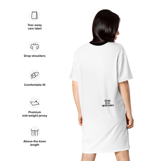 Woman wearing a Black & White Body Silhouette T-Shirt Dress shown from the back with features highlighted including tear away care label, drop shoulders, comfortable fit, premium mid-weight jersey fabric, and above-the-knee length.