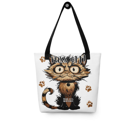 White tote bag featuring a cartoon cat with the phrase "Puss Off!" and paw prints, Tote Bag – Puss Off, offering faith-inspired apparel with melanin-rich imagery and purpose-driven messaging.