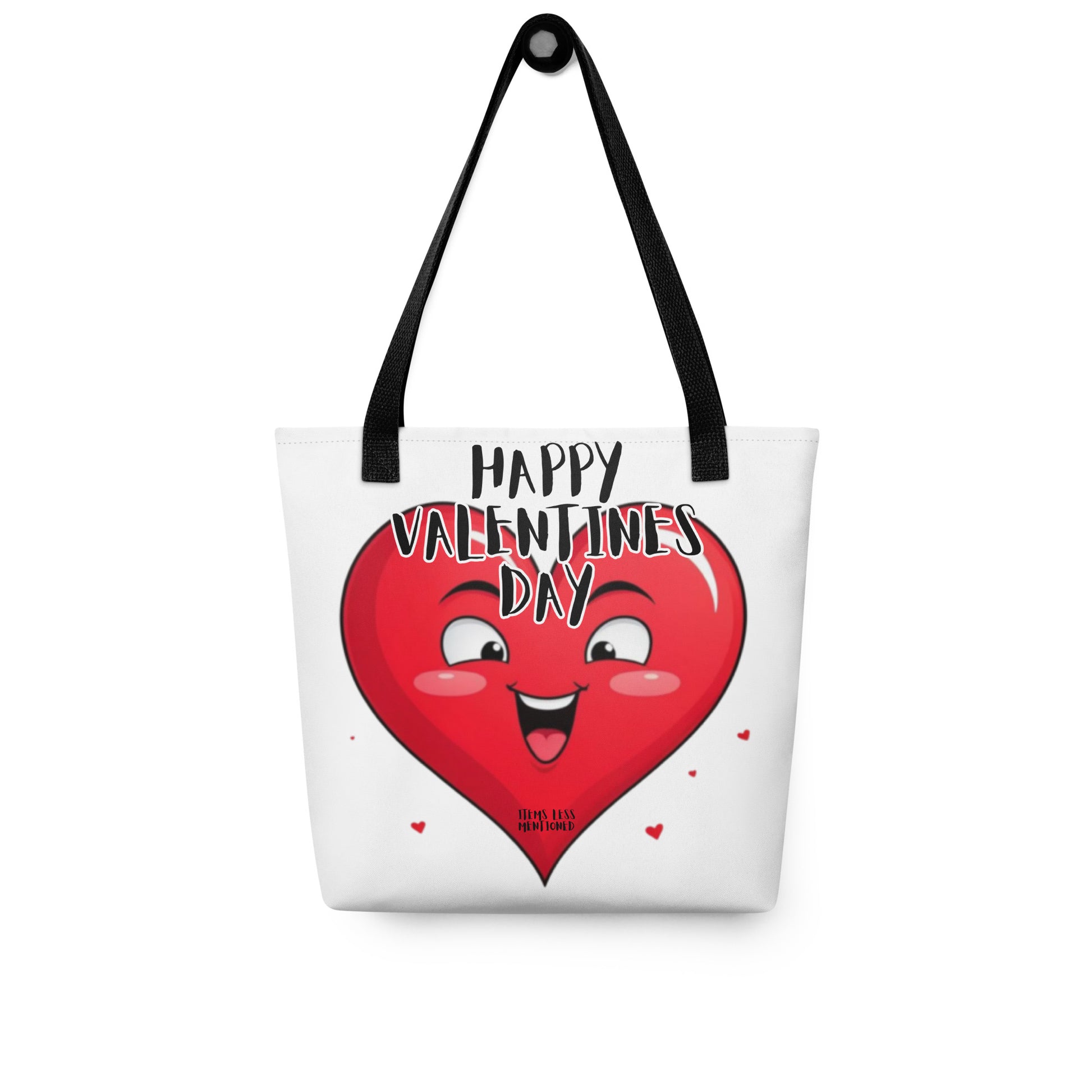 Tote Bag – Happy Valentine featuring a cheerful red heart with smiling face and black straps, blending faith-inspired apparel with melanin-rich imagery and purpose-driven messaging.