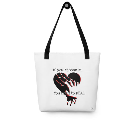 White tote bag with black handles featuring a black heart graphic and the text "If you reSonate You need to HEAL", branded as Tote Bag – If You Resonate You Need to Heal