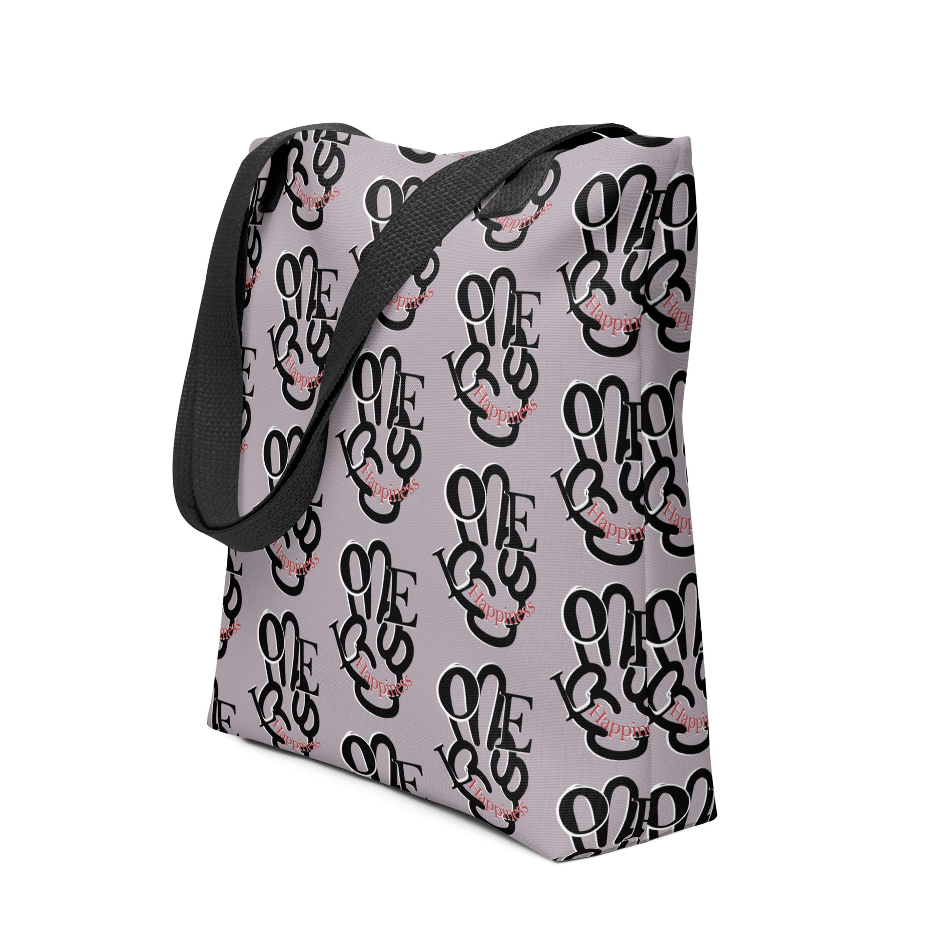 Tote Bag – One Love Peace Sign featuring a repeated black and pink typography design on a light gray background with black shoulder straps, perfect for everyday use.
