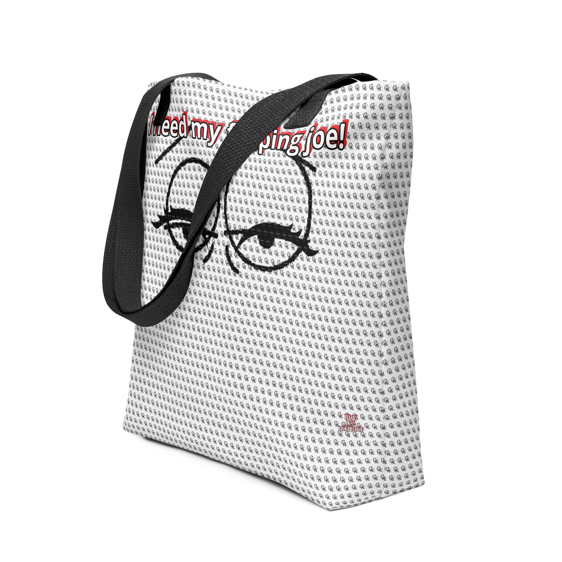 Tote bag featuring a black and white pattern with an expressive face design and the phrase "I need my flipping joe!" in red, with black handles, Bag – I Need My Flipping Joe.