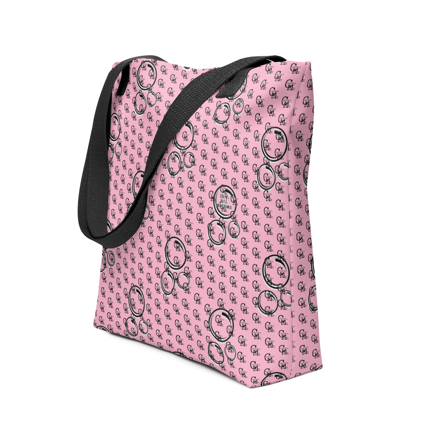 Pink tote bag with black bubble patterns and black handles, designed for everyday use, featuring the product name Bag – Bubbles.