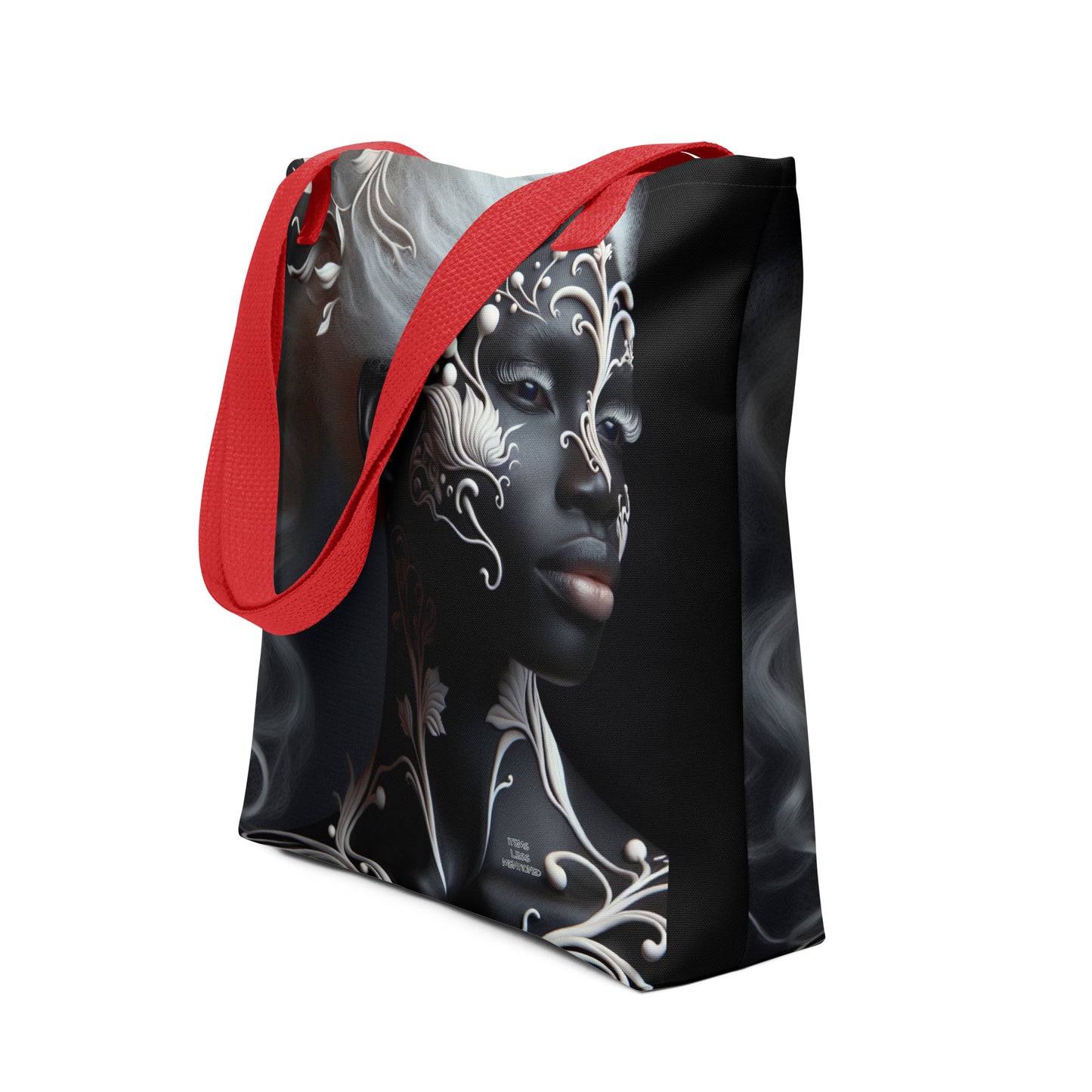 Tote Bag – Botanical Woman featuring a striking portrait of a Black woman with intricate white floral designs on her face and body, contrasted by bold red straps, combining melanin-rich imagery with faith-inspired and purpose-driven messaging.