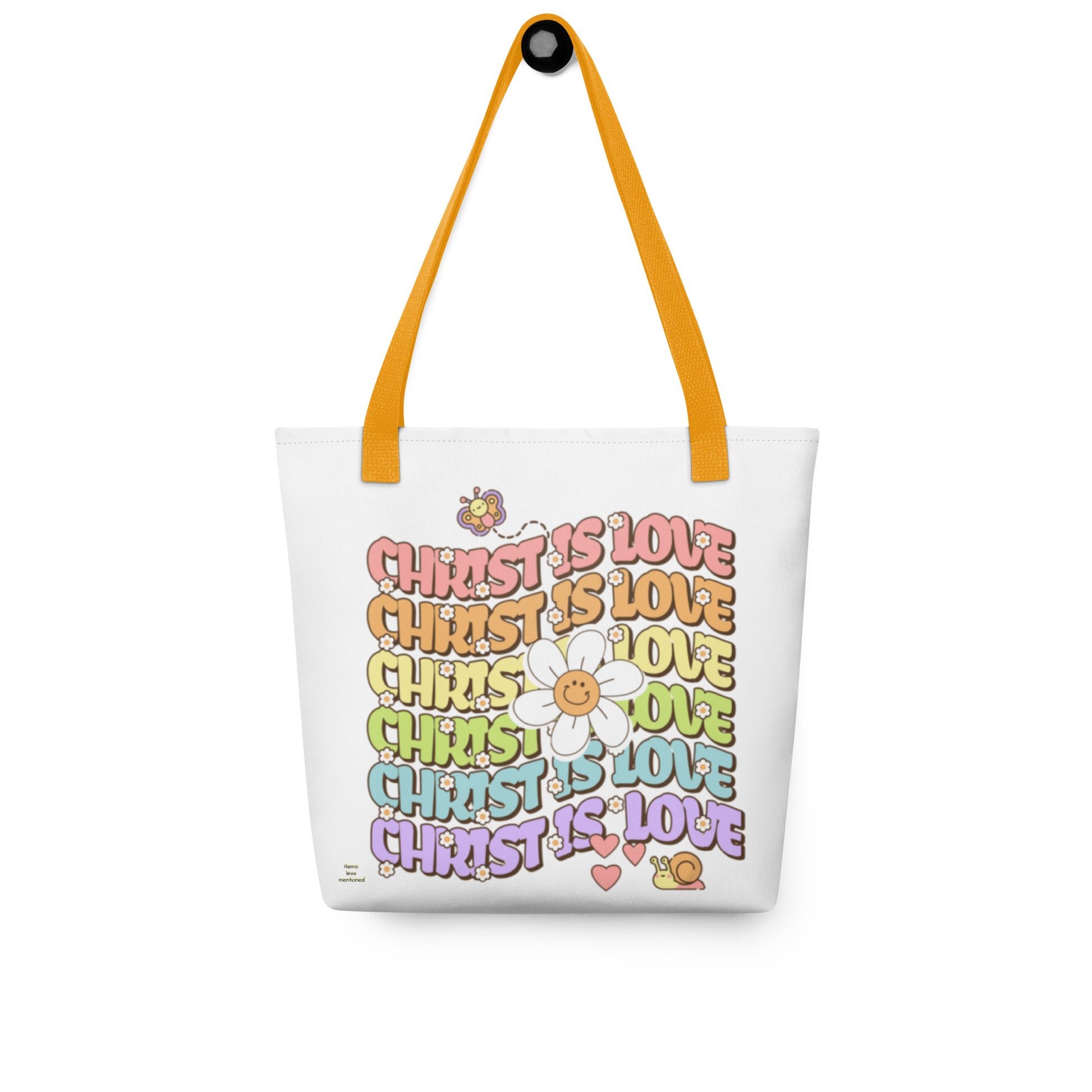 Tote Bag – Christ Is Love featuring colorful repeating text with a smiling flower, butterfly, and snail, natural cotton material with bright orange handles, faith tote bag design.