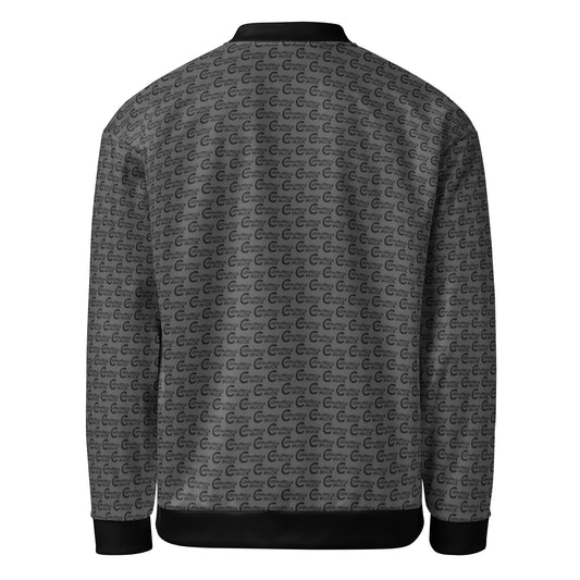 Back view of Melanin Made Steel Gray Unisex Bomber Jacket featuring an all-over subtle pattern, black ribbed cuffs, and waistband, combining style and comfort in melanin fashion apparel.