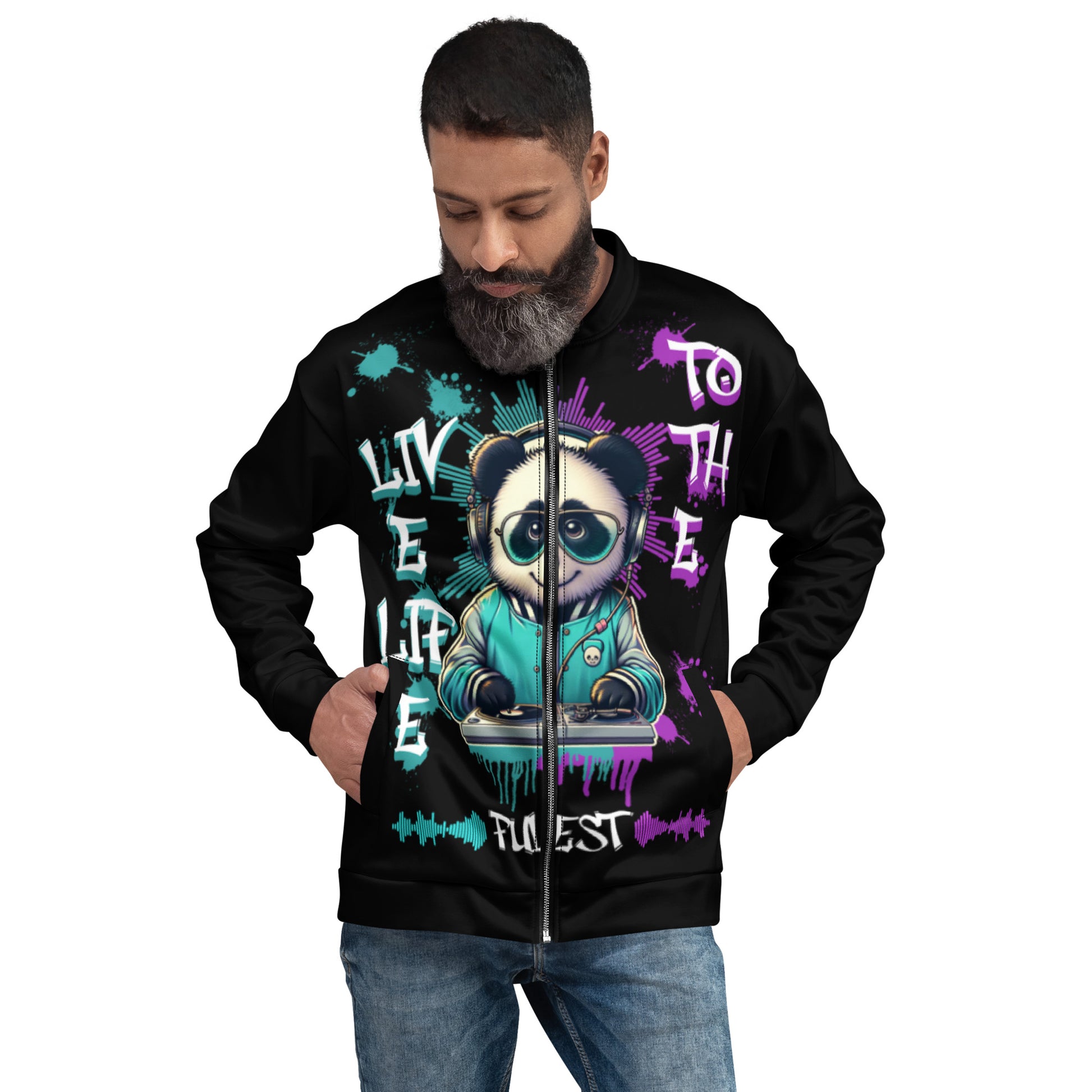 Man wearing a black Live Life to the Fullest Unisex Bomber Jacket featuring a colorful graphic of a panda DJ with teal and purple artistic splashes and text design.