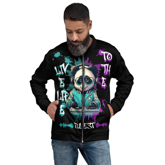 Man wearing a black Live Life to the Fullest Unisex Bomber Jacket featuring a colorful graphic of a panda DJ with teal and purple artistic splashes and text design.