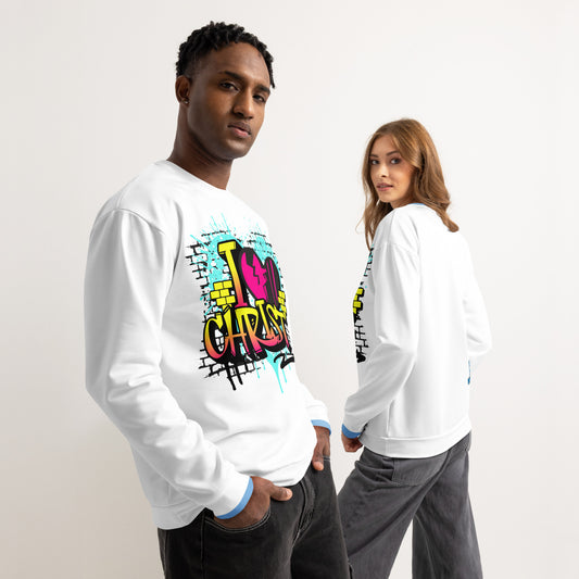 Two models wear a white Unisex Sweatshirt – I Love Christ featuring vibrant, colorful graffiti-style faith-inspired artwork, blending melanin-rich imagery with purpose-driven messaging.