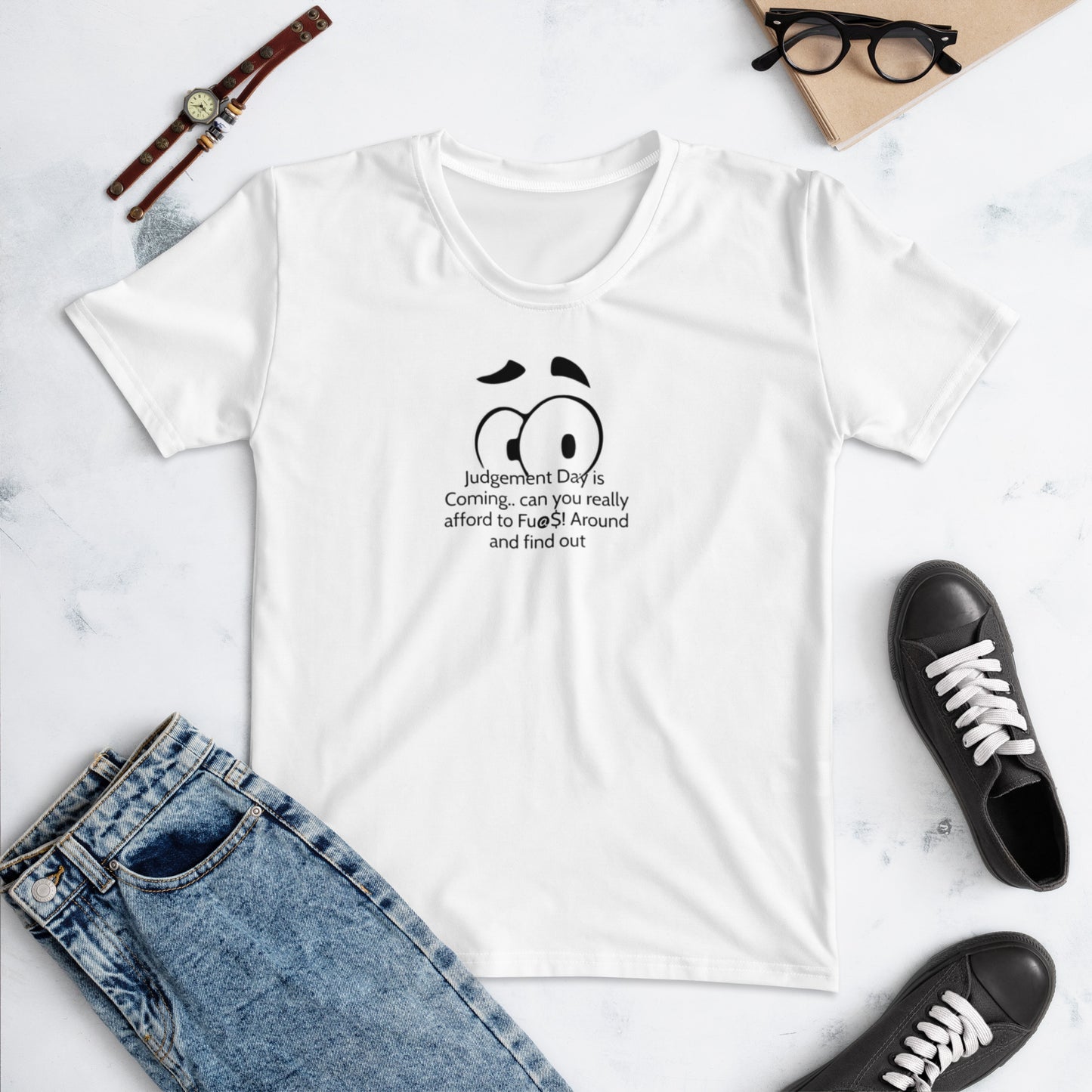 White crew neck Women's T-Shirt – Judgement Day Is Coming with a minimalist worried face graphic and text printed on the front, styled with denim jeans and black sneakers.