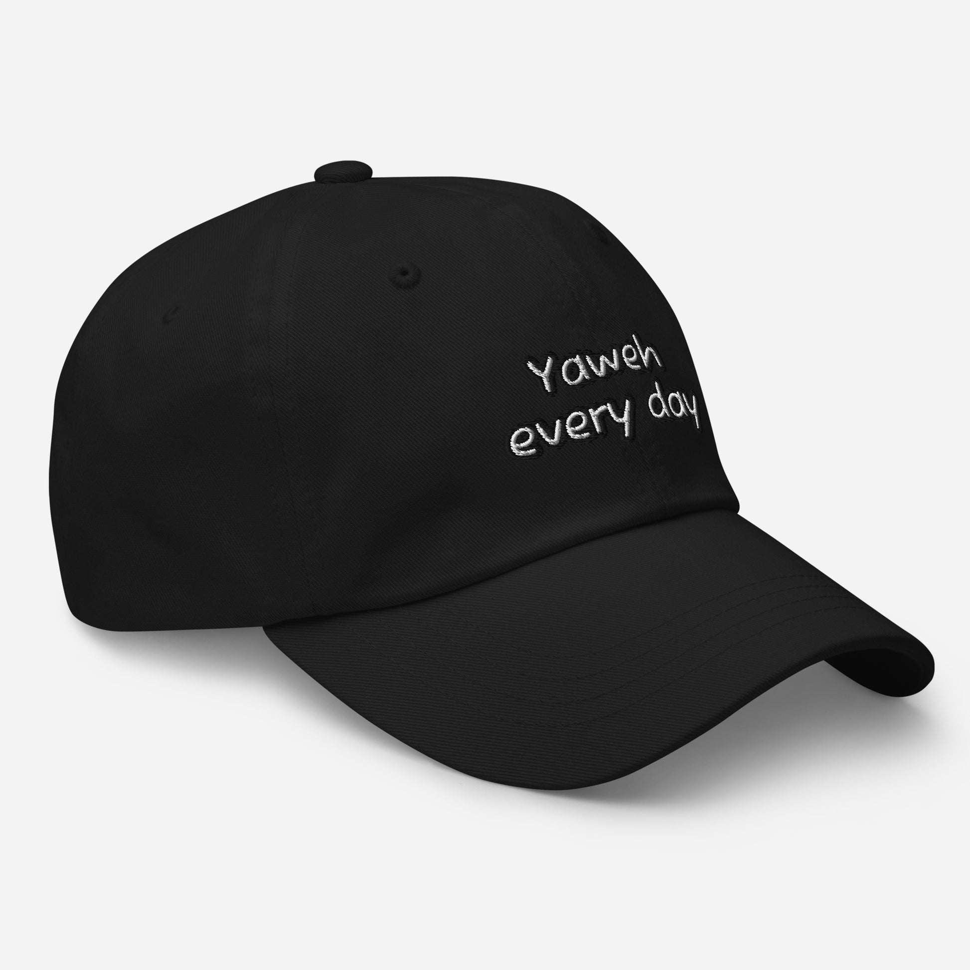 Black cotton Dad Hat – Yahweh Every Day with curved brim and white embroidered text, featuring a relaxed fit and adjustable strap, ideal for faith-inspired apparel.