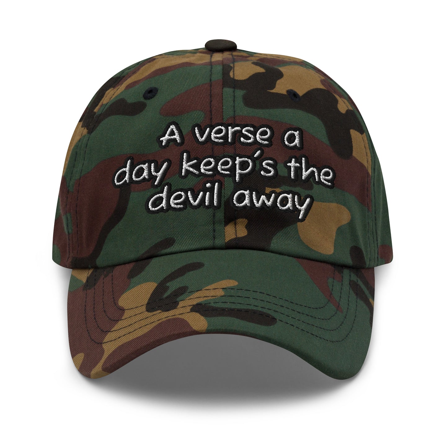 Camouflage dad hat with embroidered inspirational faith message "A verse a day keep’s the devil away" on the front, designed as a casual faith-inspired apparel piece called Dad Hat – A Verse a Day Keeps the Devil Away.
