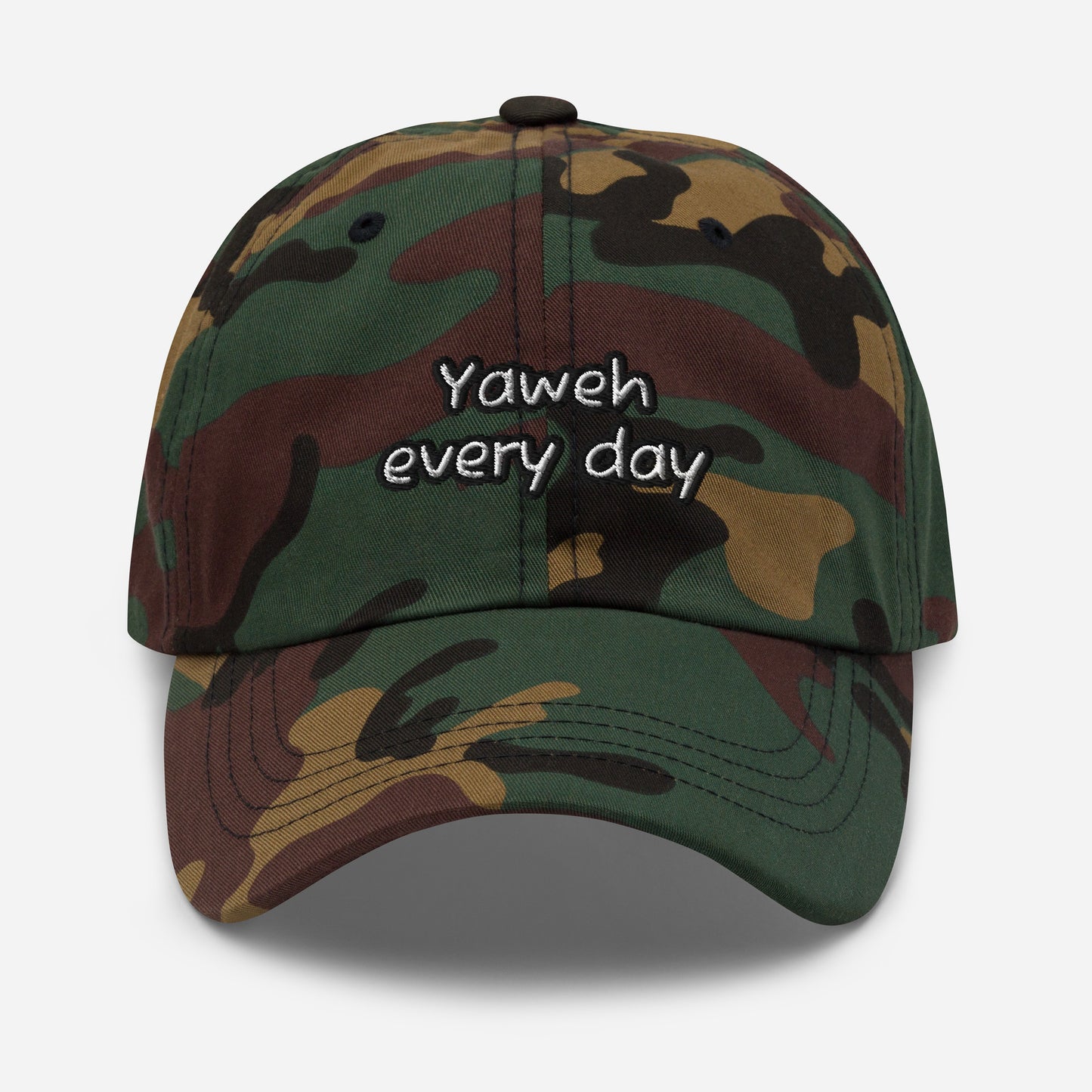 Dad Hat – Yahweh Every Day featuring a classic green camo pattern with embroidered white script text, designed as faith-inspired apparel with a casual style.