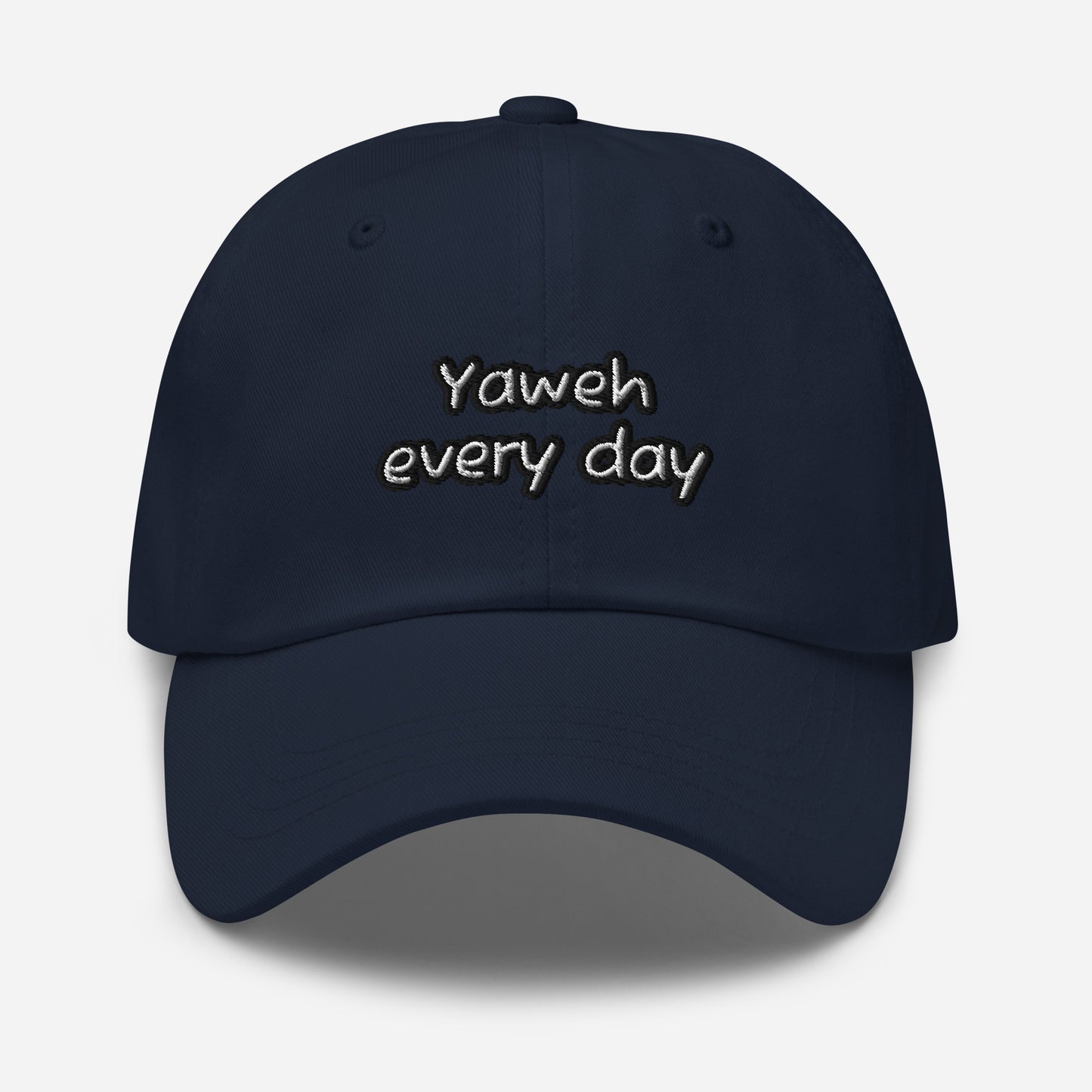 Navy blue Dad Hat – Yahweh Every Day with simple white embroidered faith-inspired text on the front, featuring a classic relaxed fit and adjustable strap.