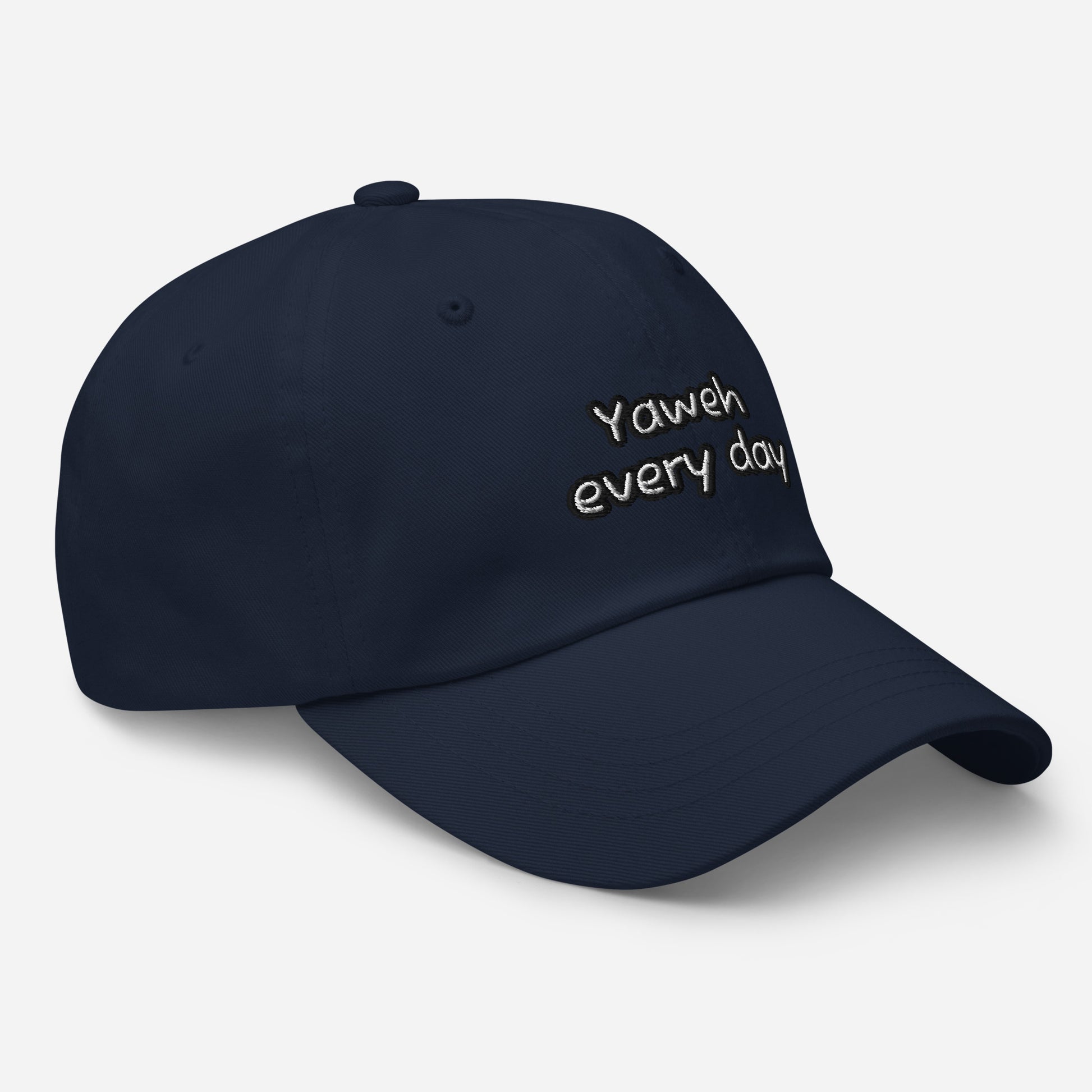 Navy blue Dad Hat – Yahweh Every Day with curved brim and embroidered white text showcasing a faith-inspired, casual accessory for everyday wear.