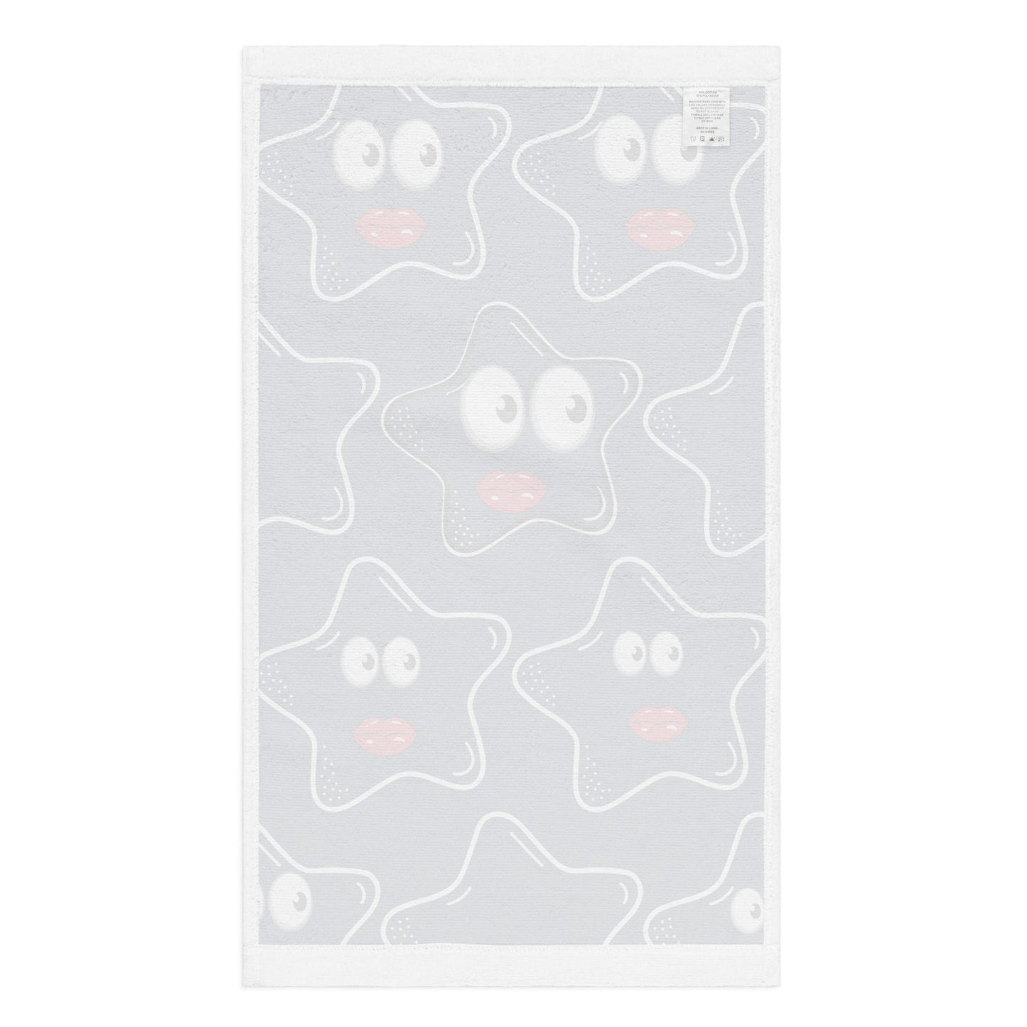Hand Towel – Stars Stars Stars featuring a white fabric with a playful star pattern with expressive eyes and soft pink lips, blending charming design with faith-inspired purpose.