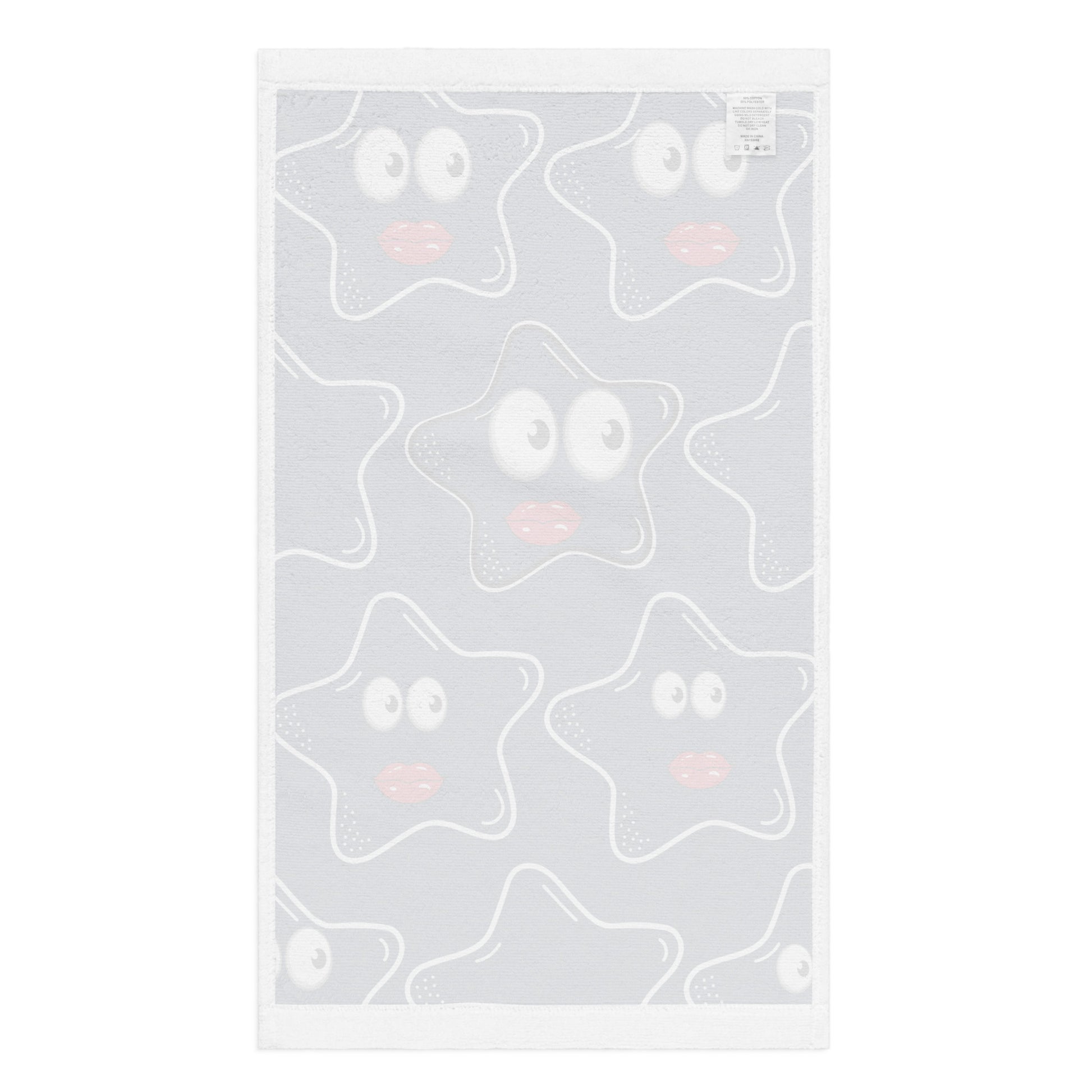 Hand Towel – Stars Stars Stars featuring a white fabric with a playful star pattern with expressive eyes and soft pink lips, blending charming design with faith-inspired purpose.