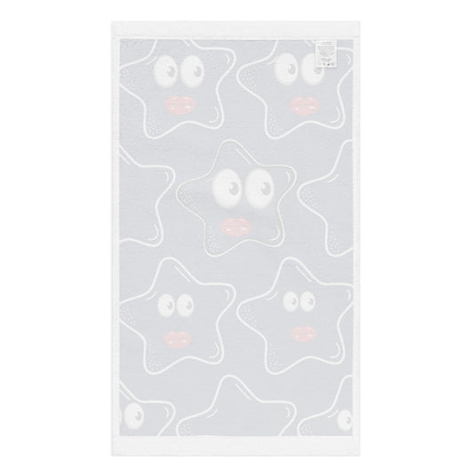 Hand Towel – Stars Stars Stars featuring a white fabric with a playful star pattern with expressive eyes and soft pink lips, blending charming design with faith-inspired purpose.