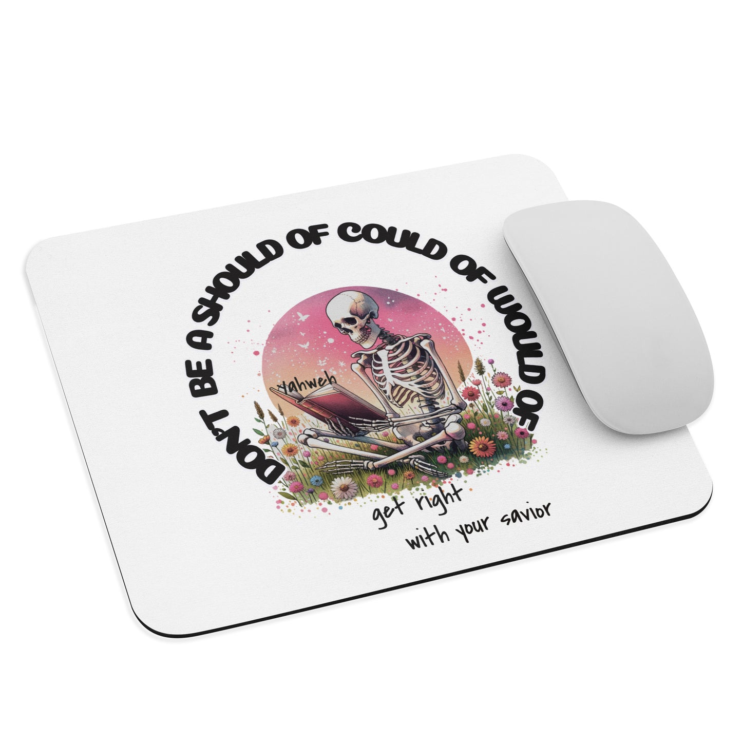 Should've Would've Could've Mouse Pad featuring a skeleton reading a book titled Yahweh surrounded by flowers with the words "Don't be a should of could of would of" and "get right with your savior" in black text on a white background.