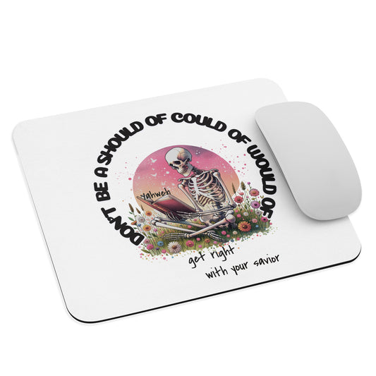 Should've Would've Could've Mouse Pad featuring a skeleton reading a book titled Yahweh surrounded by flowers with the words "Don't be a should of could of would of" and "get right with your savior" in black text on a white background.