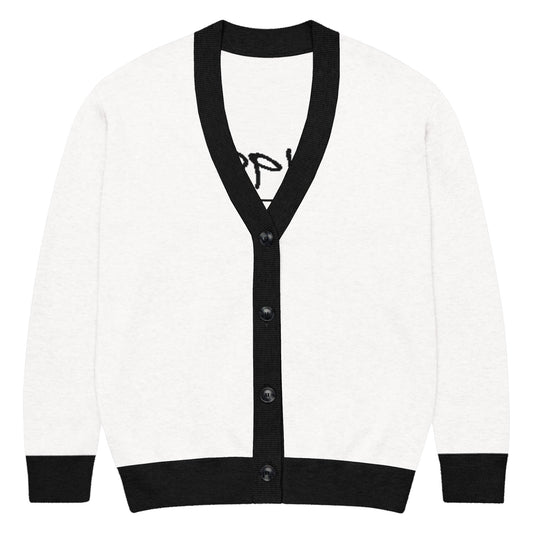 Unisex knitted cardigan in white with black trim featuring faith-inspired apparel style, melanin-rich imagery, and purpose-driven messaging. Knitted Cardigan – 1987 Rebel. Walk in purpose. Wear your faith.