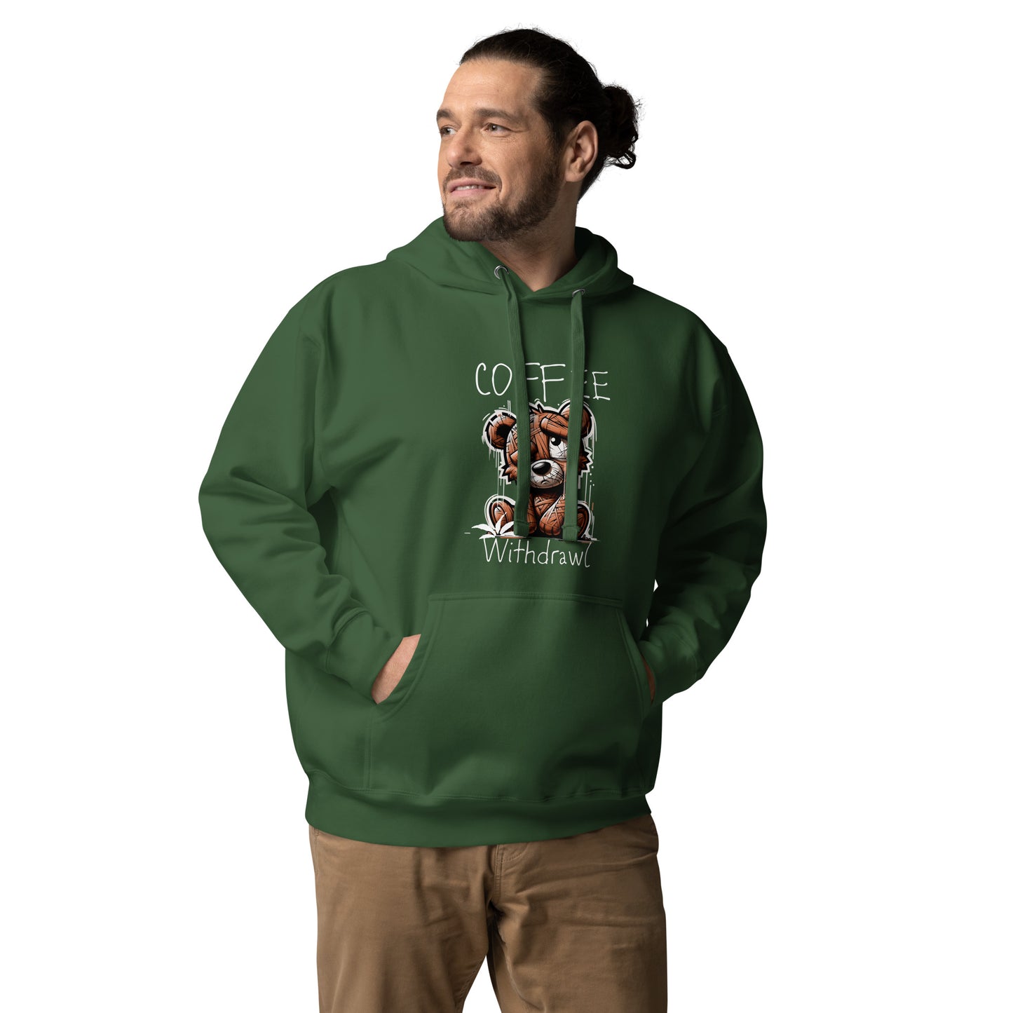 Man wearing a dark green Coffee Distressed Teddy Unisex Hoodie featuring a distressed teddy bear graphic and "Coffee Withdrawal" text, paired with tan pants.