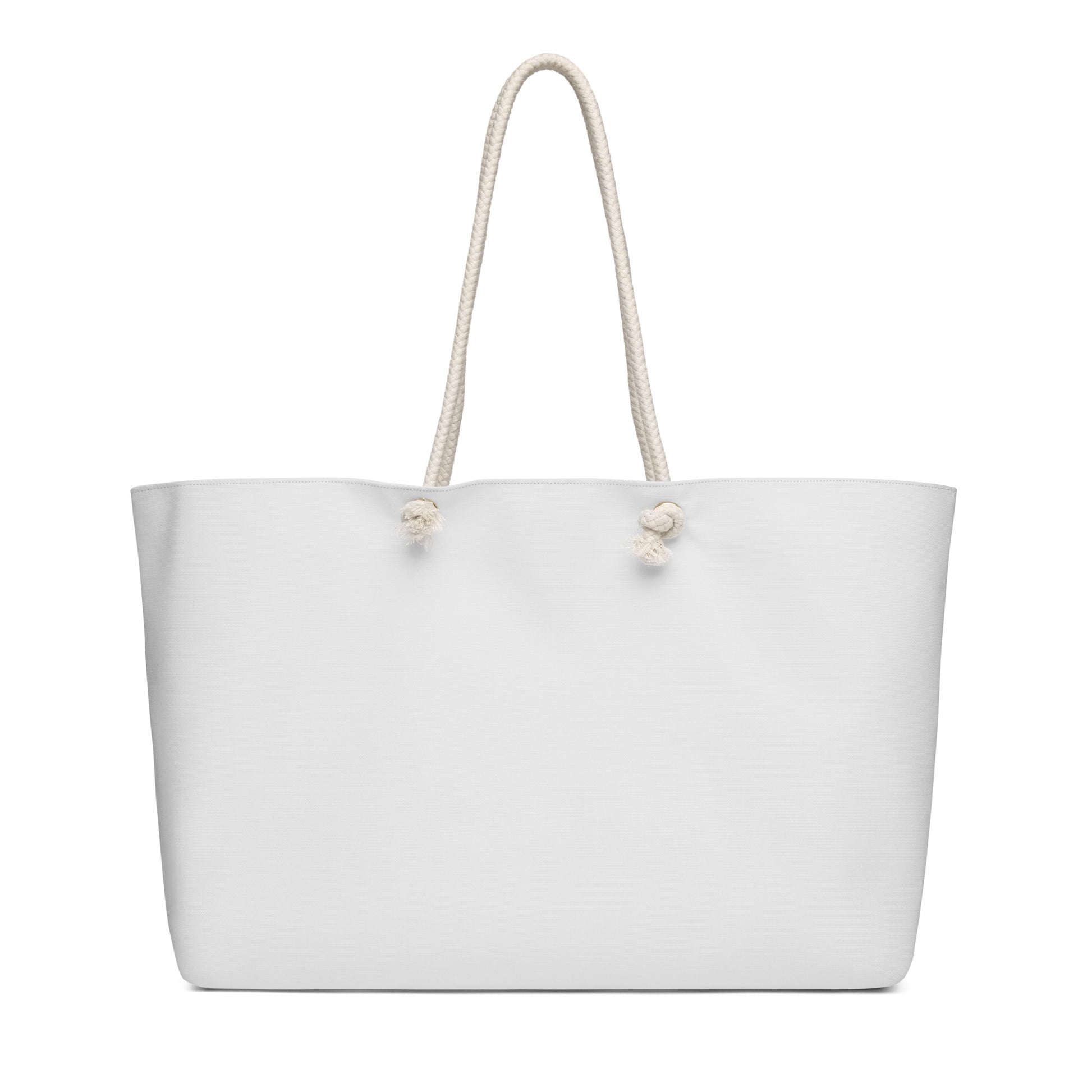 White minimalist tote bag with rope handles, ideal for everyday use and inspirational gifts, featuring the Tote Bag – Dream Big design and faith-inspired messaging.