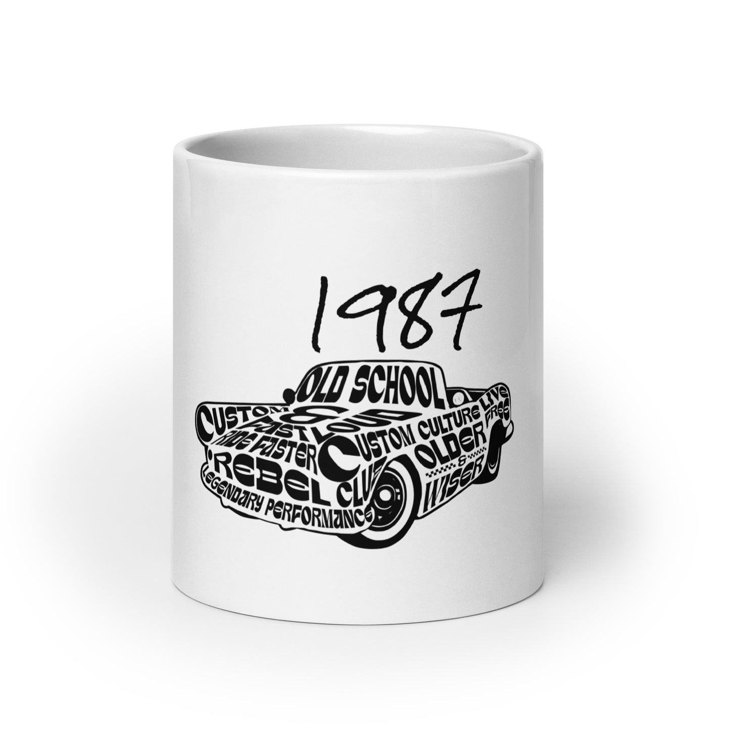 White glossy mug featuring a black graphic of a car with words like "Old School" and "Rebel Club" under the year 1987, titled Mug – Vintage '87 Cruiser, faith-inspired with purpose-driven messaging.