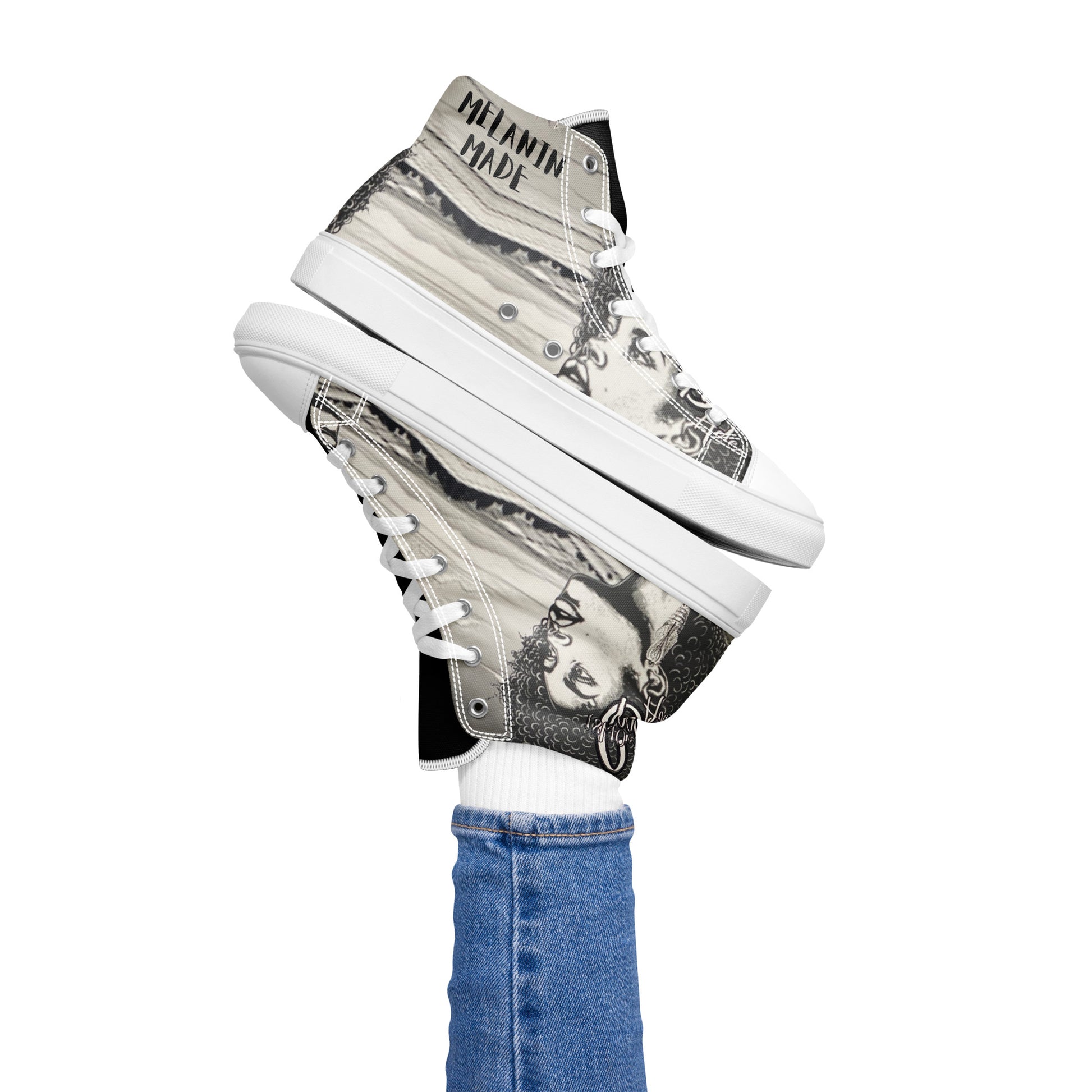 Close-up of Women's High Top Canvas Shoes – Afro Dream featuring rich Afrocentric design details on high top canvas sneakers with white laces, celebrating melanin and heritage.

