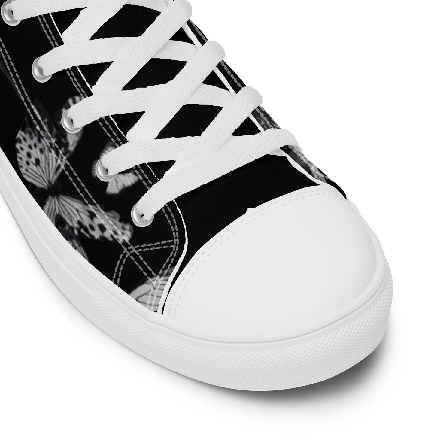 Close-up view of Women's High Top Sneakers – Butterfly in black with white laces and a butterfly print, featuring faith-inspired apparel and purpose-driven messaging.